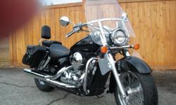 This Honda 750 Shadow Aero is in excellent condition and well cared for. Equipped with many accessories including windshield, kentucky drive saddlebags, many chrome accessories, genuine Honda backrest, cobra running boards (original pegs also come with