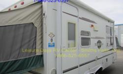 2005 Starcraft Travel Star 19CK Hybrid Trailer for sale.
This unit is in good condition and has a dry weight of approximately 3,041 lbs.
Features include:
- Sleeps up to eight (two tent ends, plus dinette and sofa convert to a beds)
- Kitchen includes