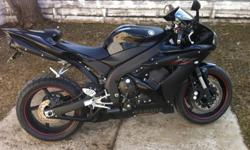 !!PRICE REDUCED MUST SELL!! I am selling my 2005 Yamaha YZF, R1. The bike is in great condition, runs perfect and has never been dropped. The bike is black with red accents, flush mount front signal lights and rear fender delete kit. It has a fuel