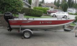 2006 14ft Deluxe Lund boat with a 25HP 4 stroke Mercury motor. Very quiet, approx 60 hrs used. Walk through, 64" beam, live well & bilge pump. 2 very comfortable swivel seats, fish finder, Scotty rod holders.
Trailer - Ez Loader with extended tongue for