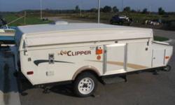 This 2006 Coachman Clipper is in excellent, clean condition. 10 foot box plus 2 foot storage compartment up front. Comfortable room for sleeping 5...king bed up front, double/queen in the back, and fold-down dinette twin. Loads of counter and storage