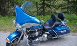 Detachable Batwing Fairing, Detachable Sissy Bar c/w Luggage Rack, Back Rest and Performance Pipes.  Have stock pipes and windshield.  Excellent condition......must see!  $14,500.00 O.B.O.   Phone Bob @ 1-250-229-4112
