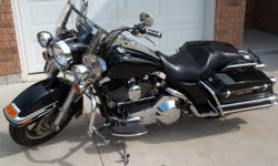 2006 Road King Police, excellent condition, includes windshield, backrest and true dual exhaust.