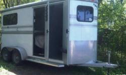 Custom from Wisconsin: Extra High/Extra Wide 2 horse bumper pull horse trailer with carpeted Dressing Room equipped with: bridle hooks,2 saddle racks,spare tire(tires in mint condition),2 hay bags,comfort flooring,padded chest and butt bars,stabilizer and