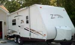 2006 KEYSTONE Zeppelin Z242, 25' sleeps up to 6,front queen bed, rear bunk beds, couch and dinette bed. Has ducted roof A/C, 2-door refrigeratorfreezer, 3-burner stove, oven, microwave, dual sink, monitor panel, bath tub with shower and skylight, furnace,