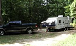 Cottage to go!  This 21ft. hybrid is terrific for family fun summer getaways OR just a weekend "decompression chamber".   Light weight (only 3,000 lbs. dry weight) so can be towed with a mini-van or SUV.  Sleeps up to 4 adults and two children. In good
