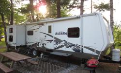 2007 Forest River Sierra 301BHD. Has dual slide outs. Large slide has dinette and sofa bed couch which provides an open floor plan for the kitchen. The second slide is the bunk room which gives the kids extra room for sleeping and playing on those rainy
