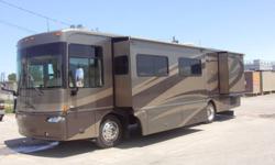One Owner.  Stored Inside.  350 HP Diesel.  6 spd Allison. Full body paint.  Fibreglass roof.  Keyless entry. Sleeps 6.  Sat dish. 2 TV's.  Dash & central air, backup camera, leather sofa bed, chairs and lazy boy.  dinette sofa bed slide out.  Bedroom