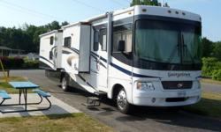 Must be Seen! 37' Bunkhouse model bought new in 2009 and in new condition. Model has kingsize bed in master with 24" TV, bunk beds have 2 TV's with DVD players and wireless headsets. Rare model with 4 slides, pull out couch with queen bed, 32" LCD flat