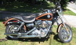 2008 Harley - 105th Anniv. Super Glide Custom
That's right 822 KM - no time to ride....I am the original owner...bought the bike brand new..all stock cept for the mid-size windsheild...
 
Located in Simcoe Ontario