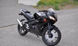 2008 Honda CBR125R in black for sale. This is a great starter bike for new riders. Inexpensive to own and easy to operate, while also being fun and practical.
 
Full tank of gas costs $6-7 and lasts up to 3 weeks. Insurance is also very low. For me, it