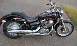 Brand new 2009 Honda Shadow Spirit, hardly broken in. 750 cc engine, nice metallica charcoal colour. Comes with quick release windshield, slip on saddlebags & bike cover. Asking $7500 call 778-415-3997  or 250-640-4782