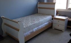 Single size bed, ideal for children.Almost new with small marking.White and birchBedside table and bed frame both wood.Bedside table with 2 spacious drawers.Mattress almost new.