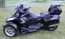 One of a kind, beautiful custom black Can Am Spyder, RTS Limited. Custom foot board, spoiler and wing. New rear tire and chrome package. Over $10,000.00 in customising. Must be seen. After 6:00 pm, call 613-835-9027.