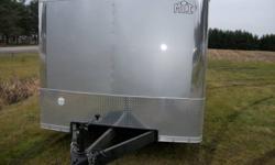 24 ft Middlebury aluminum car hauler/enclosed. It has rubber ride suspension,drive on door,rollers under the rear for driving over curbs, 5000lb Superwinch with remote, extended tongue so it can be hauled with a motor home, LED lighting and has been