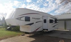 2010 Crossroads Cruiser 31 QB Description : A UNIQUE BUNK MODEL AS THE QUAD BUNKS ARE AT THE FRONT OF THE CAMPER AND THE MASTER BEDROOM IS IN A SLIDEOUT AT THE REAR.  ALSO IN THE MASTER IS A 1/2 BATH. ALONG WITH THE LARGE LIVING ROOM SLIDE IS A LCD TV,