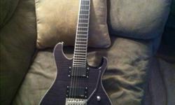 2010 Prs Se Torero with grey flame top (discontinued color).
24 fret (25.5 scale)
Original Floyd Rose tremolo
Locking nut
Emg 81/85 active pickups.
Ebony fretboard (no inlays)
Prs designed tuners
Mahogany body
3 way switch with 1 volume 1 tone.
Neck thru