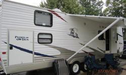 2010 30 foot Puma FQSS for sale. Front Queen bedroom and second bedroom at the back with Double bed and single bunk on top. Sleeps 8. Full slide out for dinette and couch. On the inside - Full bath, 2 way Fridge, Gas stove and oven, Furnace, AC, Stereo