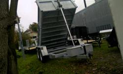 MADE IN ONTARIO
2011 Advantage 6.5x12 Combo Dump (7 Ton) GALVANIZED
 
Features:
2x7000lb. axles = 14000lb. G.V.W.R
Electric brakes on both axles
HD slipper leaf spring suspension
16" Tires
Barn/Ramp combo
(4) 5000lb. D-ring tie downs
Sealed beam lighting