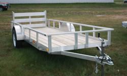 All Aluminum Railside Utility 
2 x 6 pressure treated wood deck
Bi-fold loading ramp
L.E.D. lights
2990# spring axles with E-Z Lube hubs
15 inch white modular wheels with radial tires
2990# GVW
775# curb wt.
2215# payload
Stock # 1000241
Kaldeck Trailers