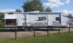 32' Trailer with bunkhouse. Mint condition, non smokers, no pets and only used 3 seasons. The trailer has 3 years of extended warranty as well. Located in Prescott, Ontario.