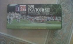 285 PGA Tour Photo and Stat Cards/1 Collectible
All PGA Tour and Senior PGA Tour Players
 
in the box - never been removed
 
includes John Daly's Rookie Card
 
This set is as near mint as it can be without being mint! I caught the kids removing the