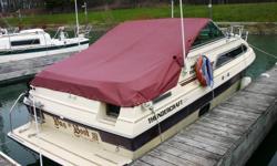 1986, 26? thundercraft magnum express. Aft cabin design, sleeps 4-5. Has a fridge, stove and head It has been very well maintained since new. It has a canvas camper top with new windows that is not shown, and a mooring cover (shown). The engine is a 350