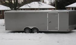 NO TRADES, NO NEGOTIATION
 
8.5 x 24 + V Nose - Pewter
2 x 5200lb. Torsion Axles with Radial Tires
Rear Ramp Door
48" Side Door with recessed Step
6'5" Interior Height
L.E.D. Lights
16" Centres on Floor, Walls and Ceiling.
White Finished Ceiling
White