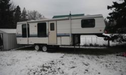 dutchman classic 28 ft fifth wheel. everything works well, easy towing even with half ton truck. suspention has been lifted for clearance. fridge replaced two years ago new also water pump replaced this last summer. 4500 or best offer call Greg at (705)