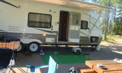 I have a very clean 29ft dutchmen lite with slide. like brand new. never used the oven or the microwave. perfect on the inside and out. comes with electric awning reversible flat screen tv with built in stereo and dvd player. queen size bed and back