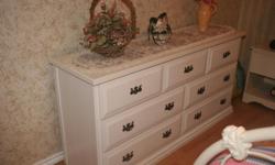 1 6 drawer dresser and 1 7 drawer dresser each $70.00
painted white