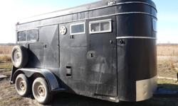I have a 2 horse straight haul horse trailer for sale.  There is a walk in tack room with an abundance of hooks and room to store equipment in with enough room to sleep.  A heater was put in by previous owner.    All new wiring done this past summer.