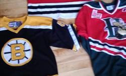 1 Boston Bruin - embroidered Orr #4 CCM Official licensed jersey Adult Medium
1 Chicago Blackhawk- embroidered #22 KOHO Official licensed jersey Adult Large
1 Halifax Moosehead QMJHL- embroidered crest, stencil lettering for Nathan McKinnon #22. Reebok