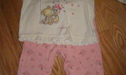 2 piece jersey knit set- George brand
6 mos- $2 EUC
Soft ivory coloured top, with button up back, embroidered teddy and flowers on the top with ruffled hems.
Pants are flowered pattern with ruffled hem.
**Please note my other ads**