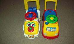 2 ride on cars.....The puppy car has seen outside...  The other one was used in the house, it also has sounds, plays music.... They both come from a smoke free home...   Pic 2&3 is a lap toy where they can pretend they are driving... makes sounds...  $5