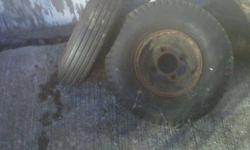 these are two small trailer tires in decent shape one is 4.80-8 the other is 5.70-8.  they both come wiith rims