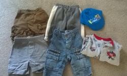 Just a handful of clothes that I have left in this size.
2 pairs of pants (one is a pair of Gap Jeans)
2 pairs of shorts
3 short sleeved diaper shirts
2 long sleeved shirts
1 sleeper
1 short sleeved/overalls outfit
3 summer onesies
baseball cap
Manchester