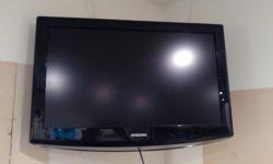 32" Samsung LCD TV. Shown with wall mount but only stand available. Comes with remote as well. If you don't like the price send me an offer. No offer will be ignored.