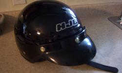 "HJC" Motorcycle helmet for sale. DOT approved. Size is Adult Large. Color is black. Only $50. We are located in Orleans. See our list of other items for sale. First come, first served.