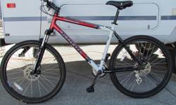 Fire Mountain mountain bike in mint condition with rock shox, disk brakes. 20" frame . This bike is a perfect fit for a teen and up. Sacrifice for $395. 2502020110.