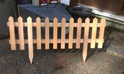 7.50 each. 3 FEET LONG, PICKETS ARE 12 INCHES TALL, WITH THE GROUND SPIKES BEING 18 INCHES TALL, WILL MATCH END TO END WITH MORE OF THE SAME. HAVE MANY FOR SALE. MADE FROM RED CEDAR AND GALVANIZED SPIRAL NAILS. also have 2 foot tall picket fences with