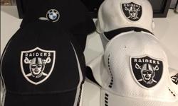 3 different Raiders Ball caps and BMW ball cap 15 dollars each, The raiders cap with black front is a small. the raiders white cap is Medium large, The raiders cap black is large -xl large and the BMW is one size fits all