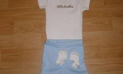 I am selling 3 cute little outfits. My son never got to wear them because he came out such a big boy. They were washed with baby Ivory Snow detergeant and never worn. From a smoke free pet free home :)
1st outfit is Carter's Little Brother 3months outfit