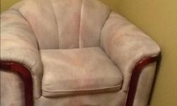 Three piece sofa set full couch love seat and a single chair. With a cherry wood trim around.excelent condition. Moving out sale