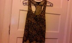 Floral tank top: size small, will fit a medium (maybe a large) (5 dollars)
Tribal black and white tank top: size medium, loose fitting (5 dollars)
Yellow cheetah tank top: size extra small, will fit small and medium (5 dollars)
If you want all three, it