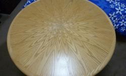 This is a custom made table in a starbust pattern that you will not see every day. The top has just been professionally refinished and is good to go