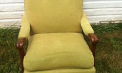 A very comfortable vintage arm chair. Arms are adorned with hand carved detail. Its in great condition with only a small rip at the back of the chair. Very clean. A beautiful piece to liven up any room.Send an email if you'd like to take a look or have a