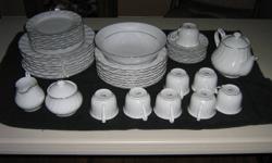 LYNNS FINE CHINA - White with gold trim - 45 piece set - in mint condition - rarely used.   $75.00  OBO 
 
8 - 10 1/2" Dinner Plates
8 -  7 1/2" Salad Plates
8 -  9" Soup Bowls
1 - 14" Serving Platter
1 - Large Serving Bowl
8 - Tea Cups with Saucers
1 -