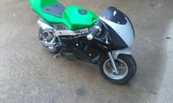 i bought a 49cc 2 stoke pocket bike last year and rode it all summer, it has a new paint job and it has solid custom footpegs that wont break. the carb has been recently cleaned. the bike has quick pickup and goes up to 55 km/h it is easy to handle and