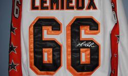 I have 4 jerseys for sale, all autographed with certificates of authenticity. The jerseys are all pro model, with fight strap attached to the back inside of the jersey. They are as follows:
Mario Lemieux white Wales conference Allstar $500 Frozen Pond